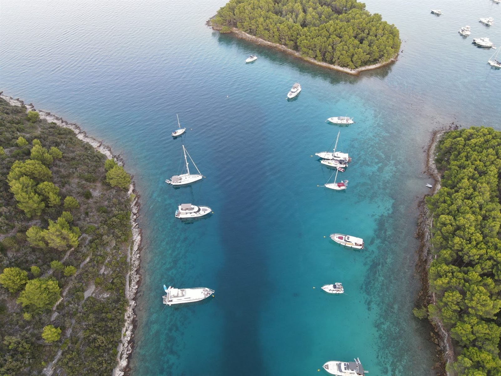 Adriatic sunset sea view in Zadar, Croatia with a boat on calm water